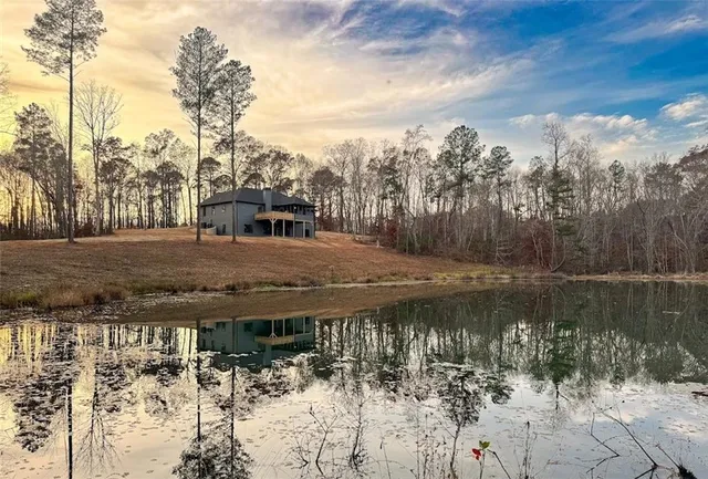 a view of a kitchen with a refrigerator and a stove