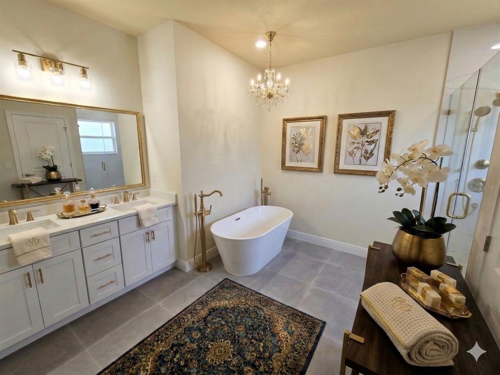 3862 Southwest 147th Street Ocala, FL 34473 - Photo 14 of 29 a spacious bathroom with a toilet sink and mirror