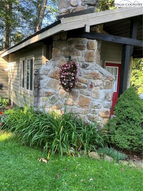 80 Pine Valley Road Newland, NC 28657 - Photo 3 of 12 a front view of a house with a yard