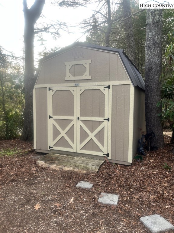 80 Pine Valley Road Newland, NC 28657 - Photo 5 of 12 a view of a house with backyard