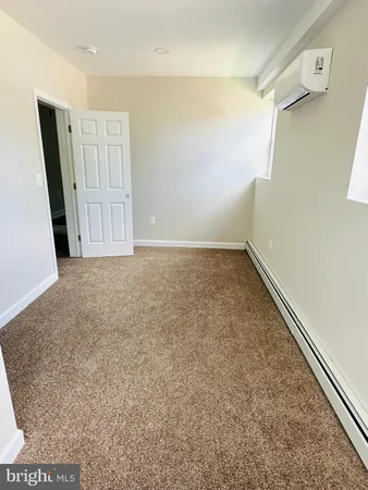 a view of a room with an empty space