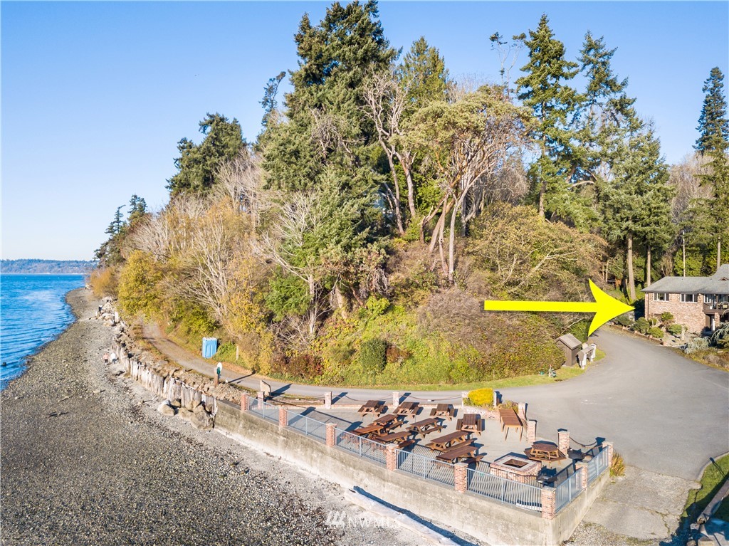731 Woodmont Beach Road South Des Moines, WA 98198 - Photo 2 of 40 a view of a swimming pool with a yard