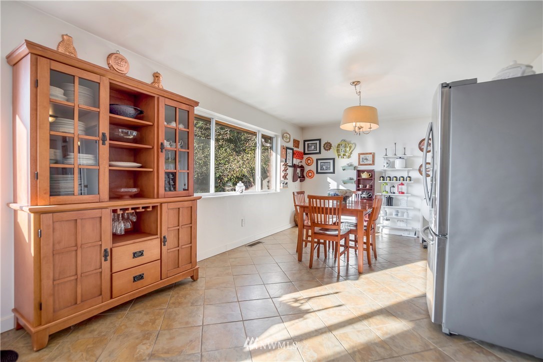 731 Woodmont Beach Road South Des Moines, WA 98198 - Photo 12 of 40 a view of a dining room and chairs in a room