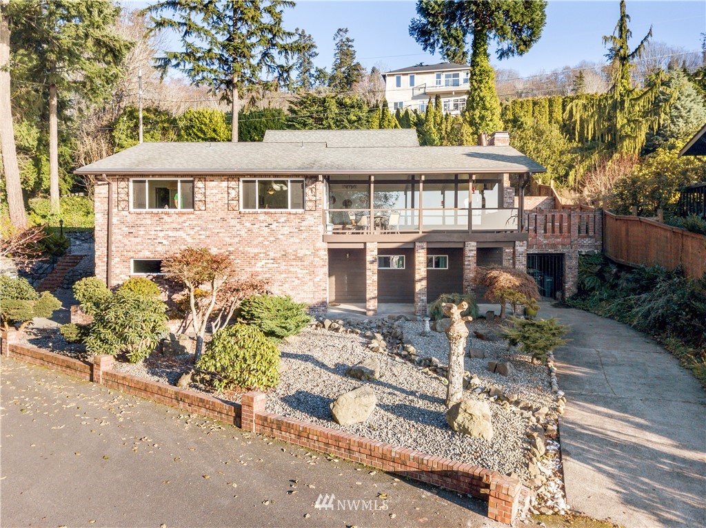 731 Woodmont Beach Road South Des Moines, WA 98198 - Photo 17 of 40 front view of a house with a bench