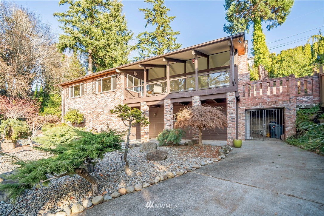731 Woodmont Beach Road South Des Moines, WA 98198 - Photo 18 of 40 a front view of a house with garden