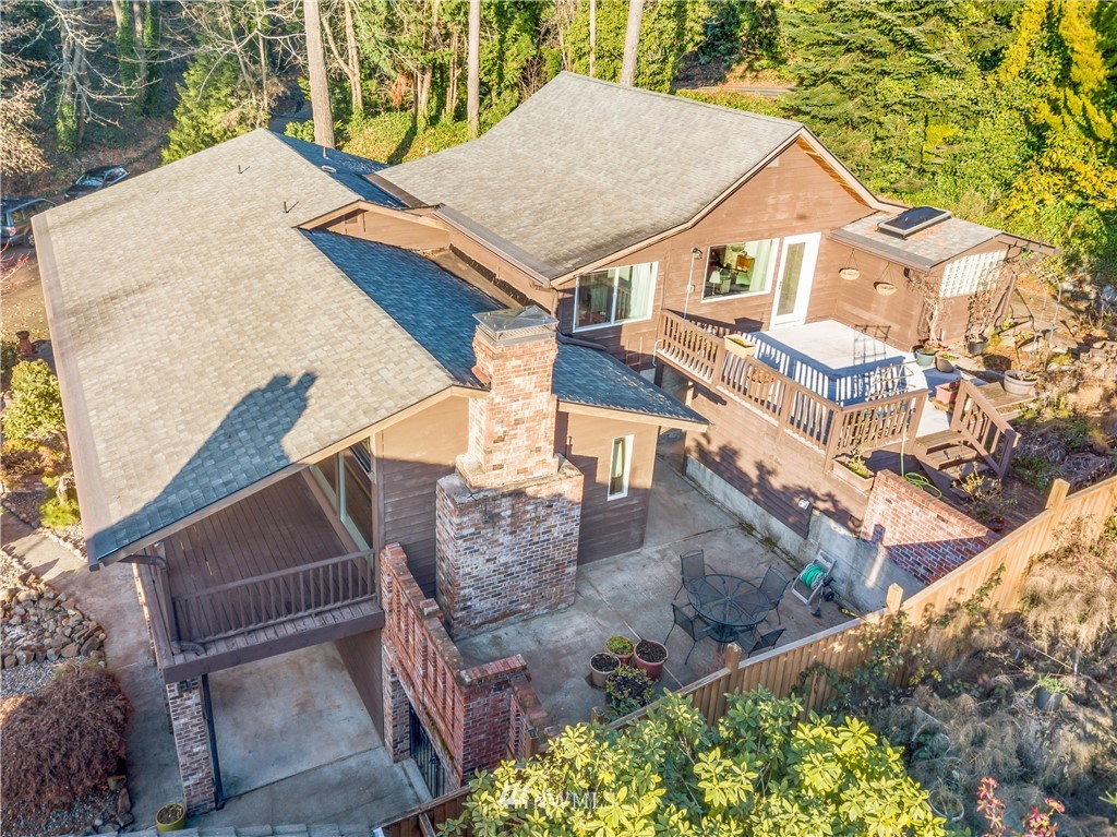 731 Woodmont Beach Road South Des Moines, WA 98198 - Photo 19 of 40 a view of a house with a mountain