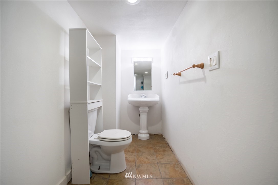 731 Woodmont Beach Road South Des Moines, WA 98198 - Photo 29 of 40 a bathroom with a toilet and a sink