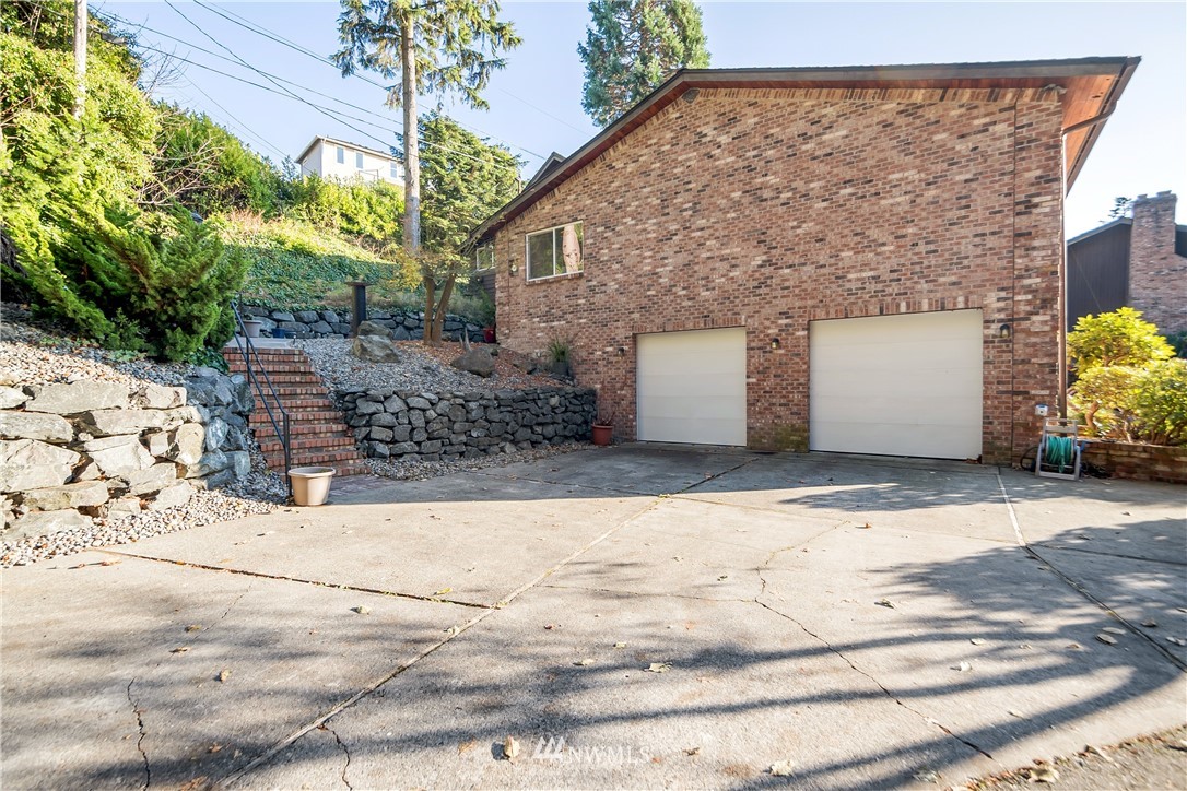 731 Woodmont Beach Road South Des Moines, WA 98198 - Photo 34 of 40 a view of a backyard of the house