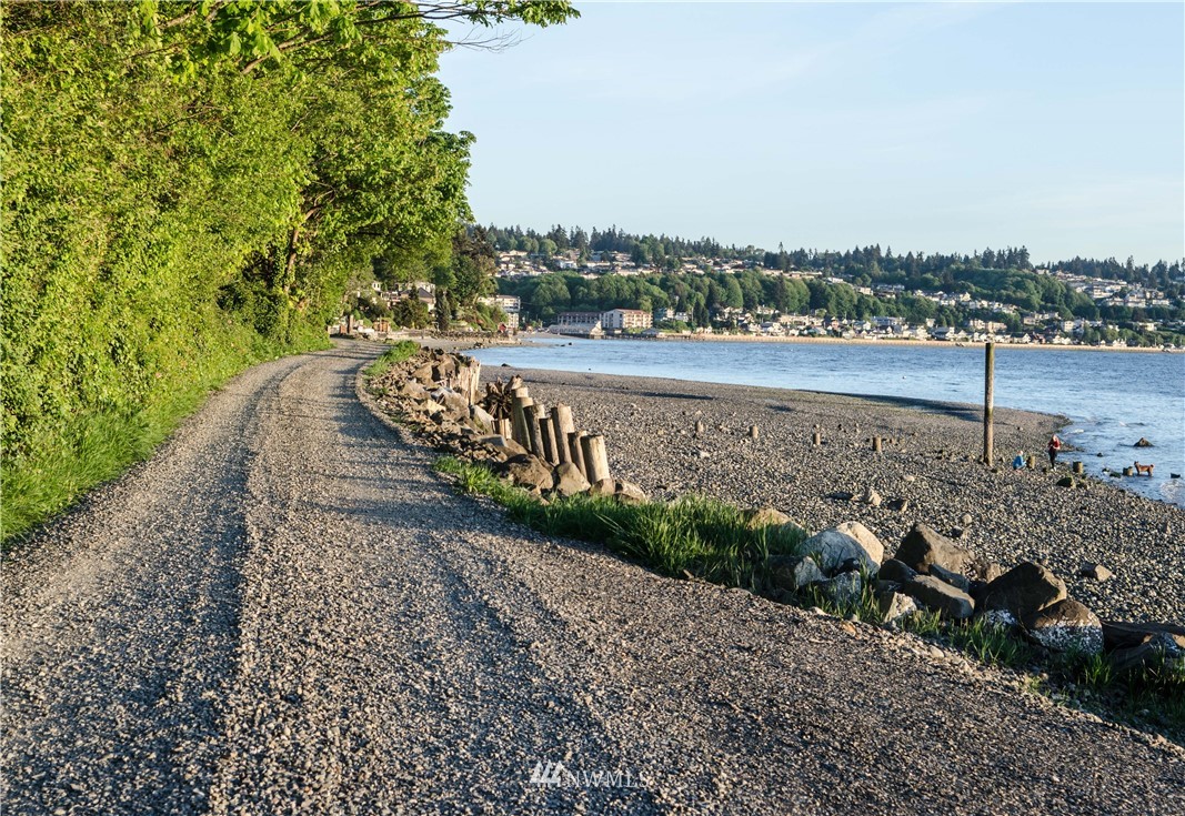 731 Woodmont Beach Road South Des Moines, WA 98198 - Photo 35 of 40 a view of a pathway both side of building with yard