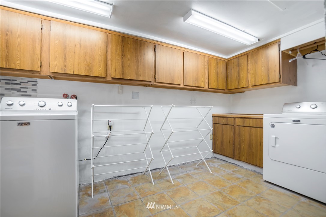 731 Woodmont Beach Road South Des Moines, WA 98198 - Photo 40 of 40 a room with storage and utility