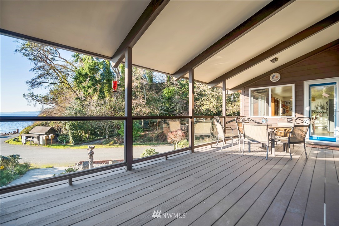 731 Woodmont Beach Road South Des Moines, WA 98198 - Photo 8 of 40 a living room with wooden floor and furniture