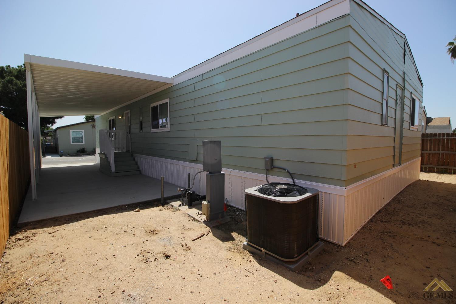 Undisclosed Address Bakersfield, CA 93308 - Photo 5 of 28 a front view of a house