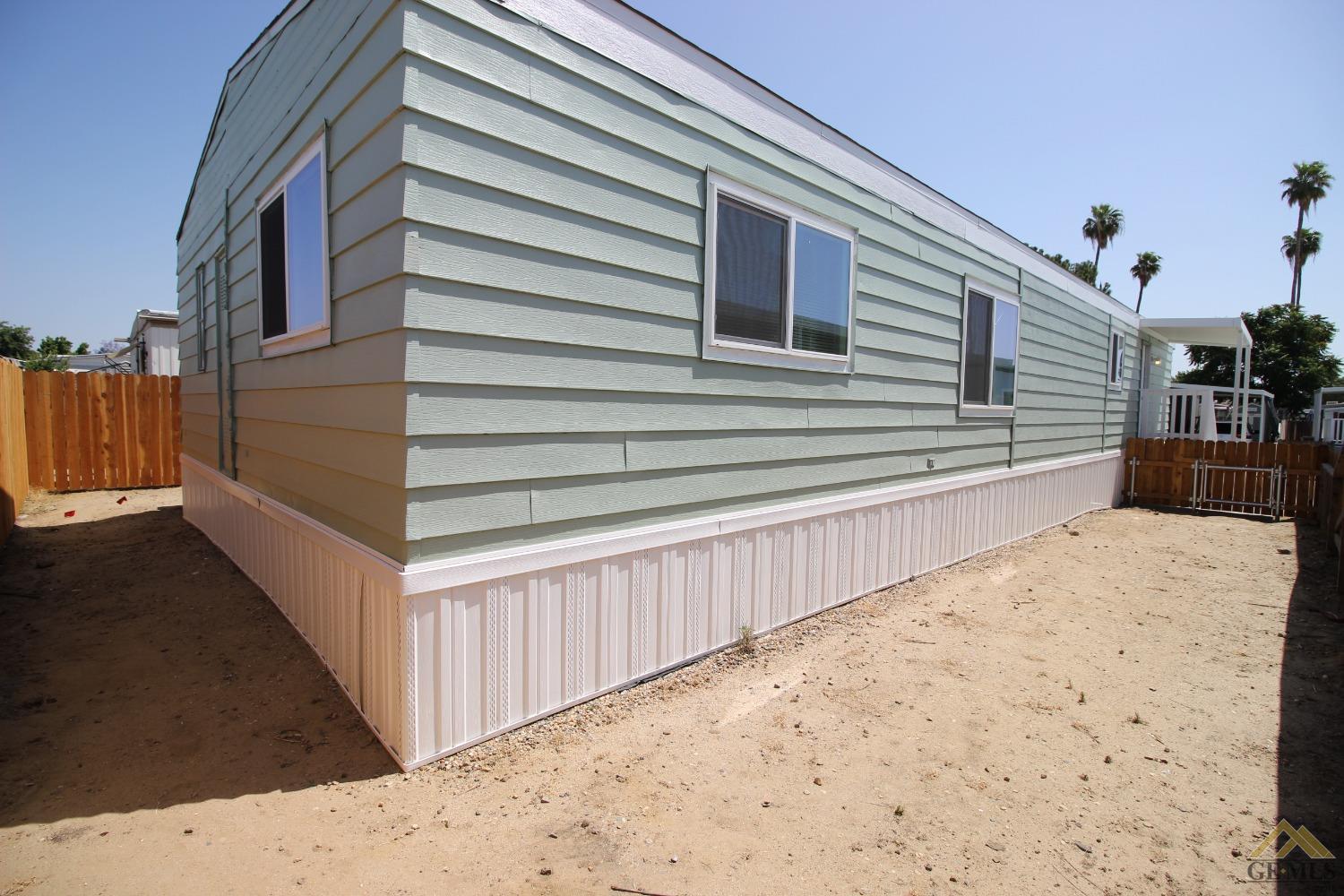 Undisclosed Address Bakersfield, CA 93308 - Photo 6 of 28 a view of a backyard of the house