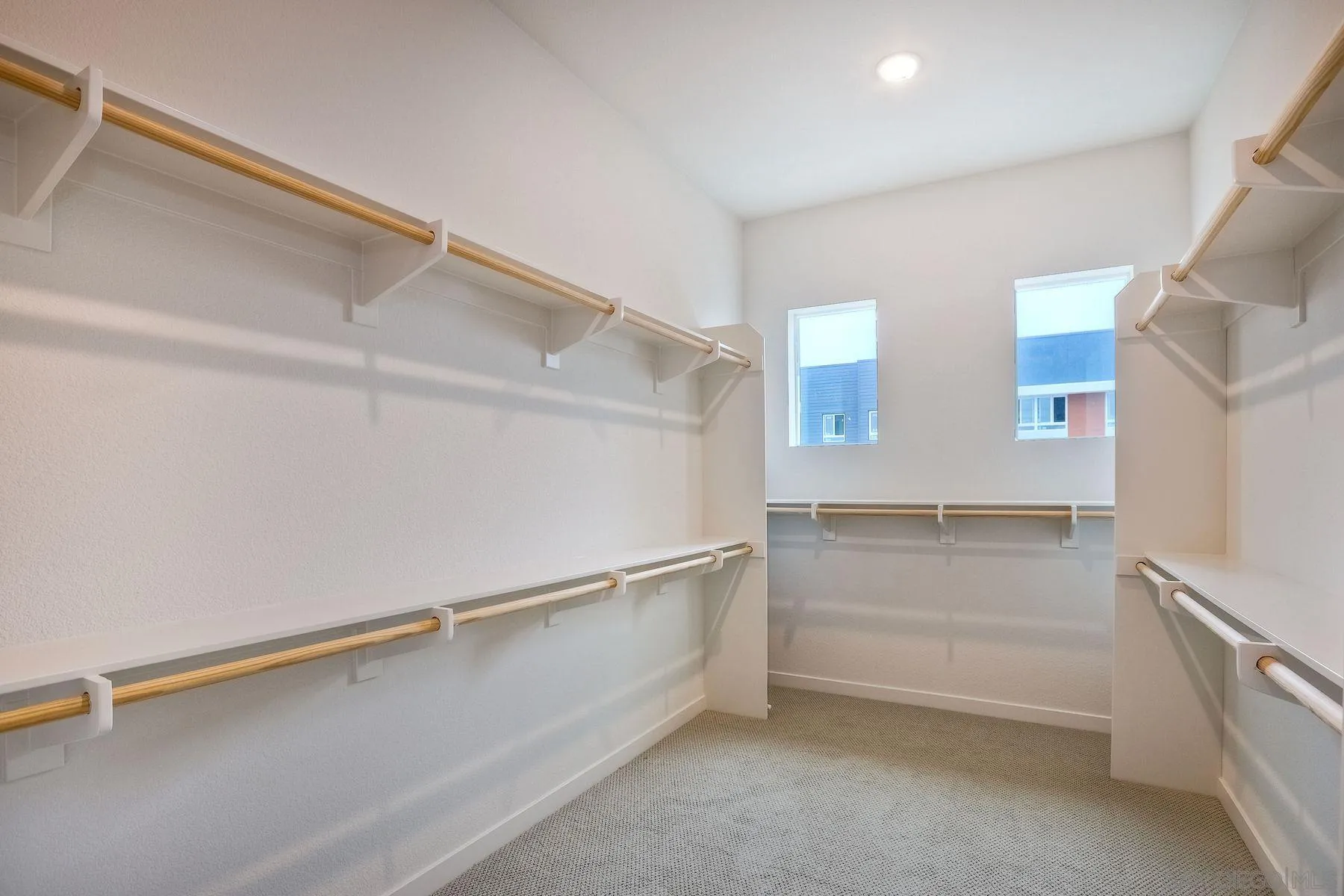 2040 Bravo Loop, Unit 4 Chula Vista, CA 91915 - Photo 15 of 25 a storage room with washer and dryer