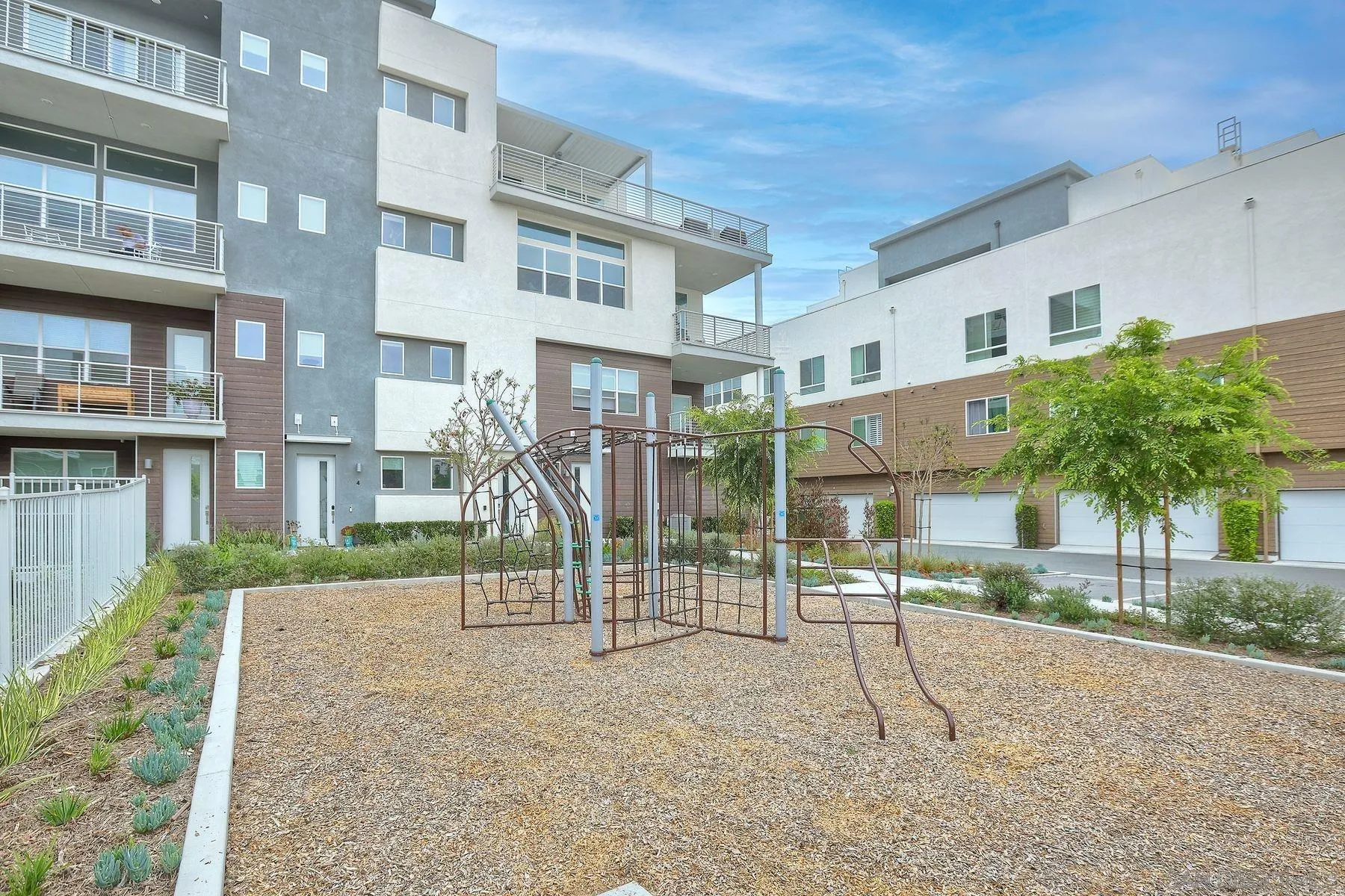 2040 Bravo Loop, Unit 4 Chula Vista, CA 91915 - Photo 18 of 25 a view of a building with a street