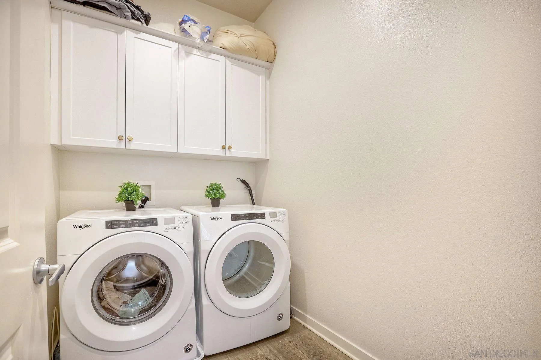 2040 Bravo Loop, Unit 4 Chula Vista, CA 91915 - Photo 6 of 25 a utility room with dryer and washer