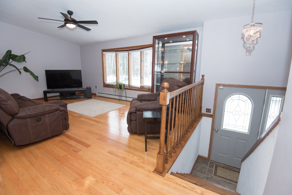 17 Fitzgerald Road Charlton, MA 01507 - Photo 8 of 30 a living room with furniture and a flat screen tv