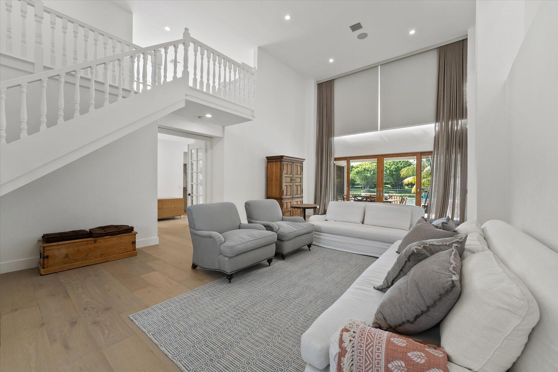 2821 Bent Cypress Road Wellington, FL 33414 - Photo 12 of 64 a living room with furniture and a window
