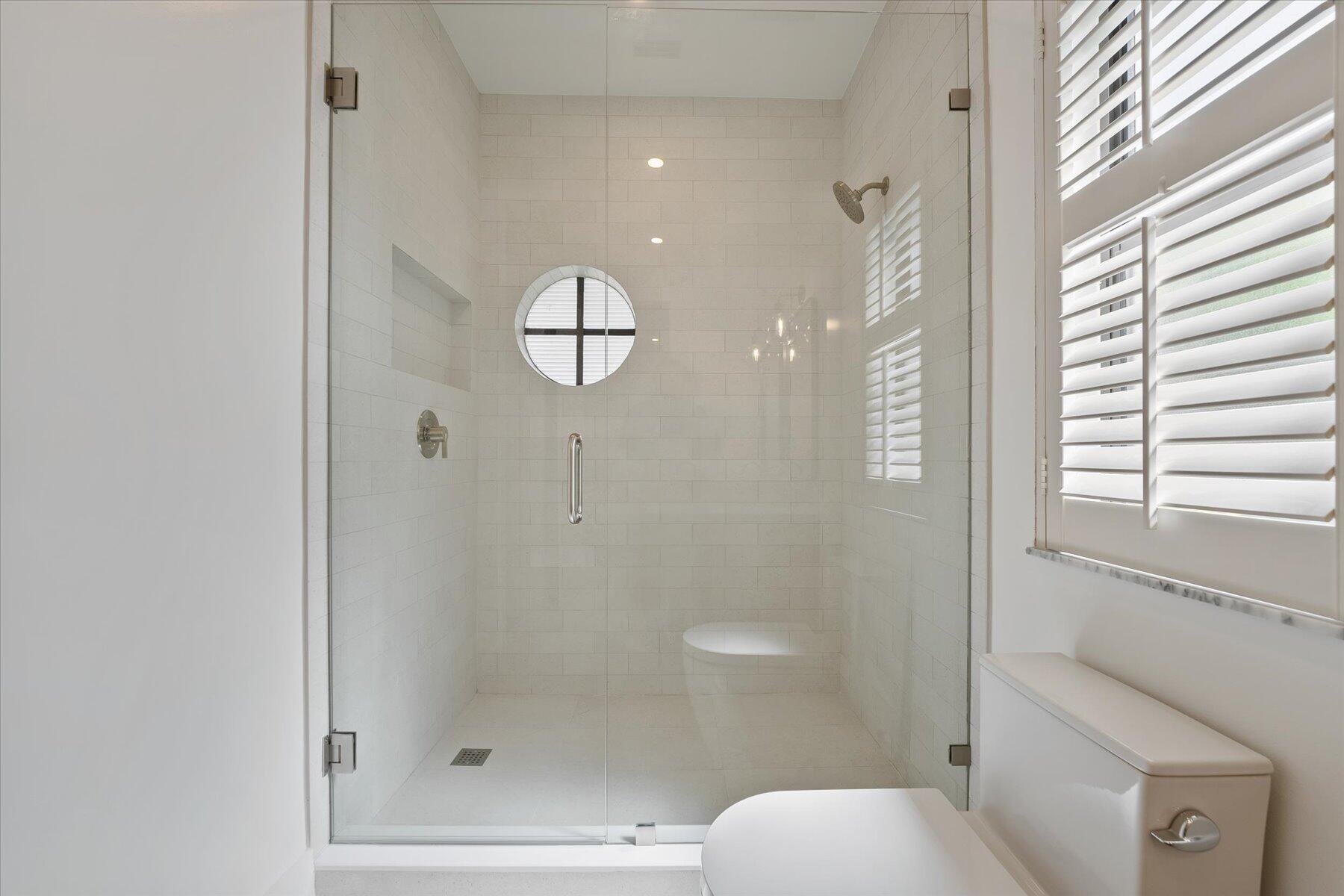 2821 Bent Cypress Road Wellington, FL 33414 - Photo 43 of 64 a bathroom with a shower and toilet