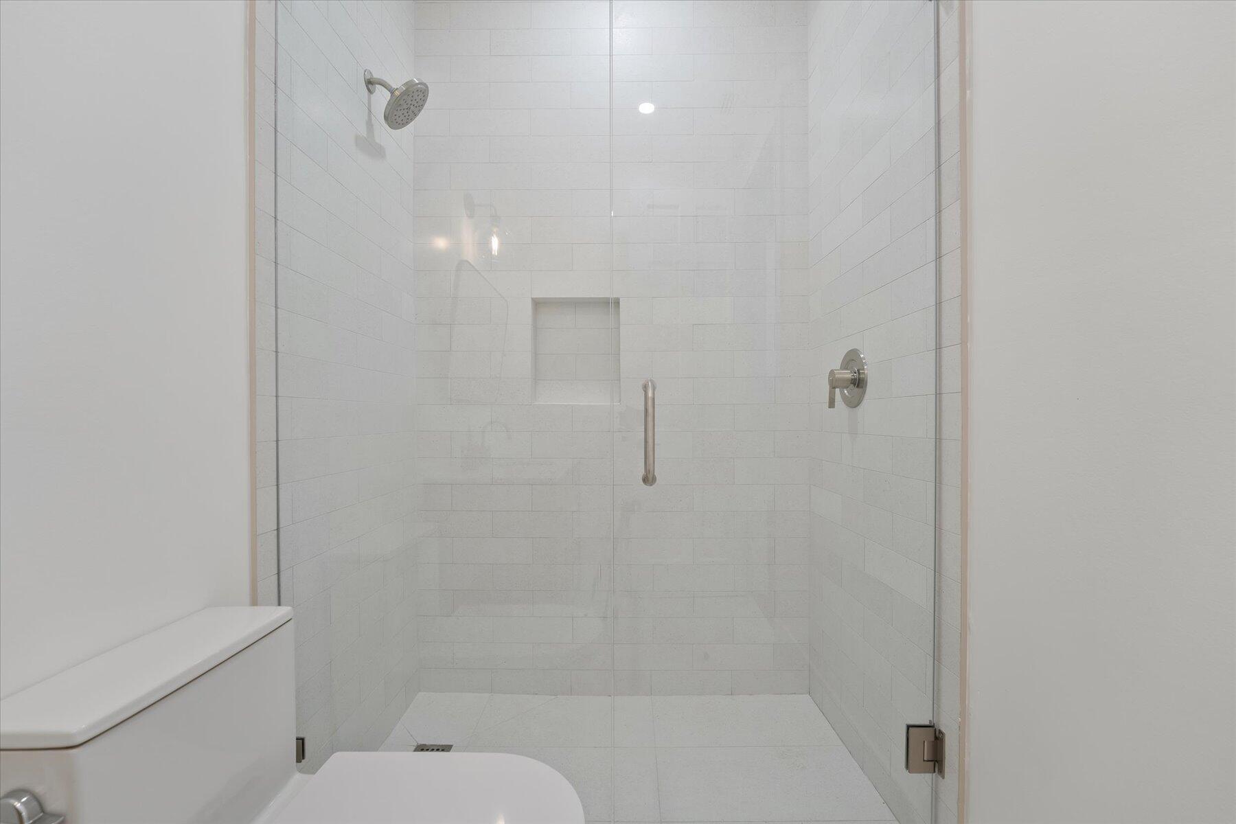 2821 Bent Cypress Road Wellington, FL 33414 - Photo 51 of 64 a bathroom with a shower and toilet