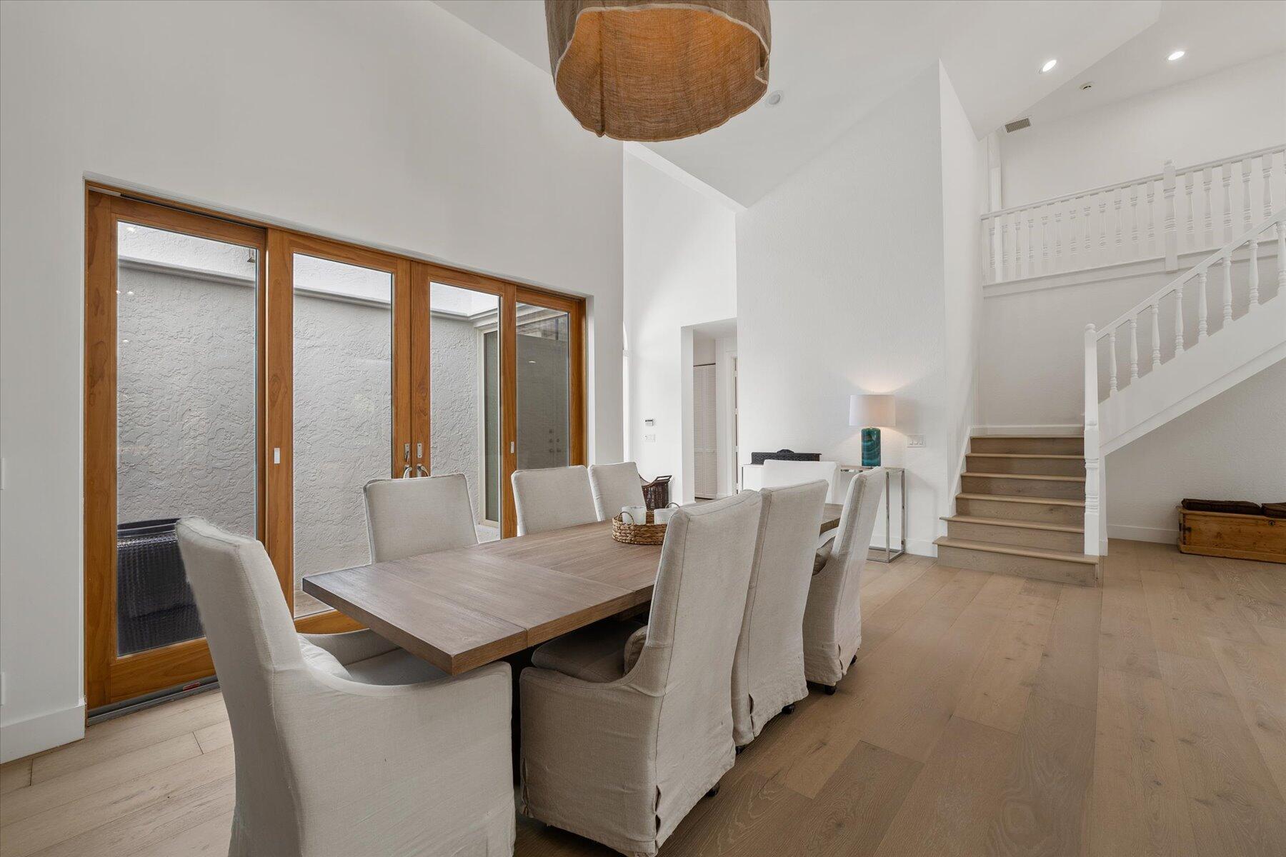 2821 Bent Cypress Road Wellington, FL 33414 - Photo 9 of 64 a view of a dining room with furniture and window