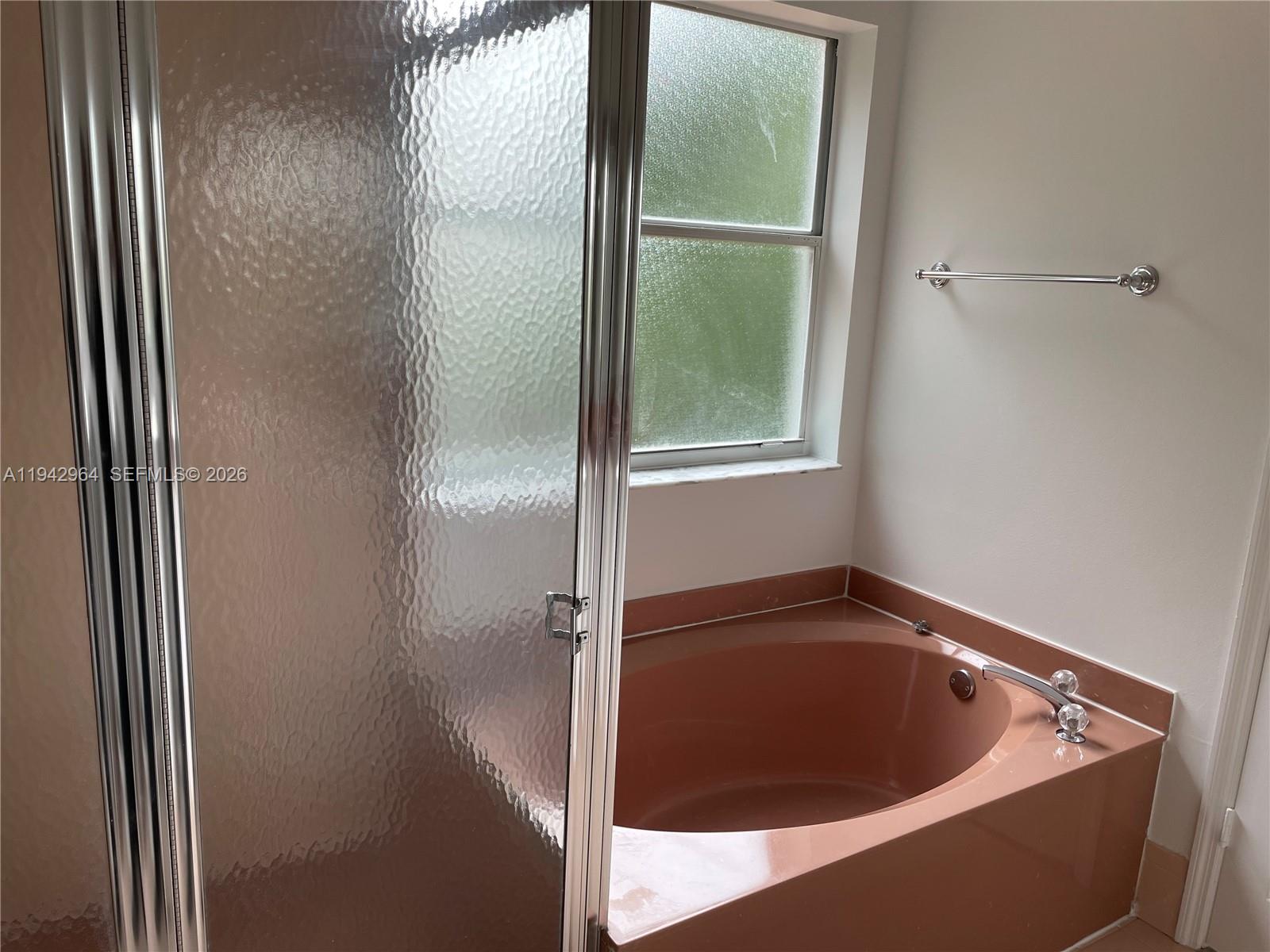 15870 Southwest 85th Lane Miami, FL 33193 - Photo 12 of 18 a view of a bathtub in a bathroom