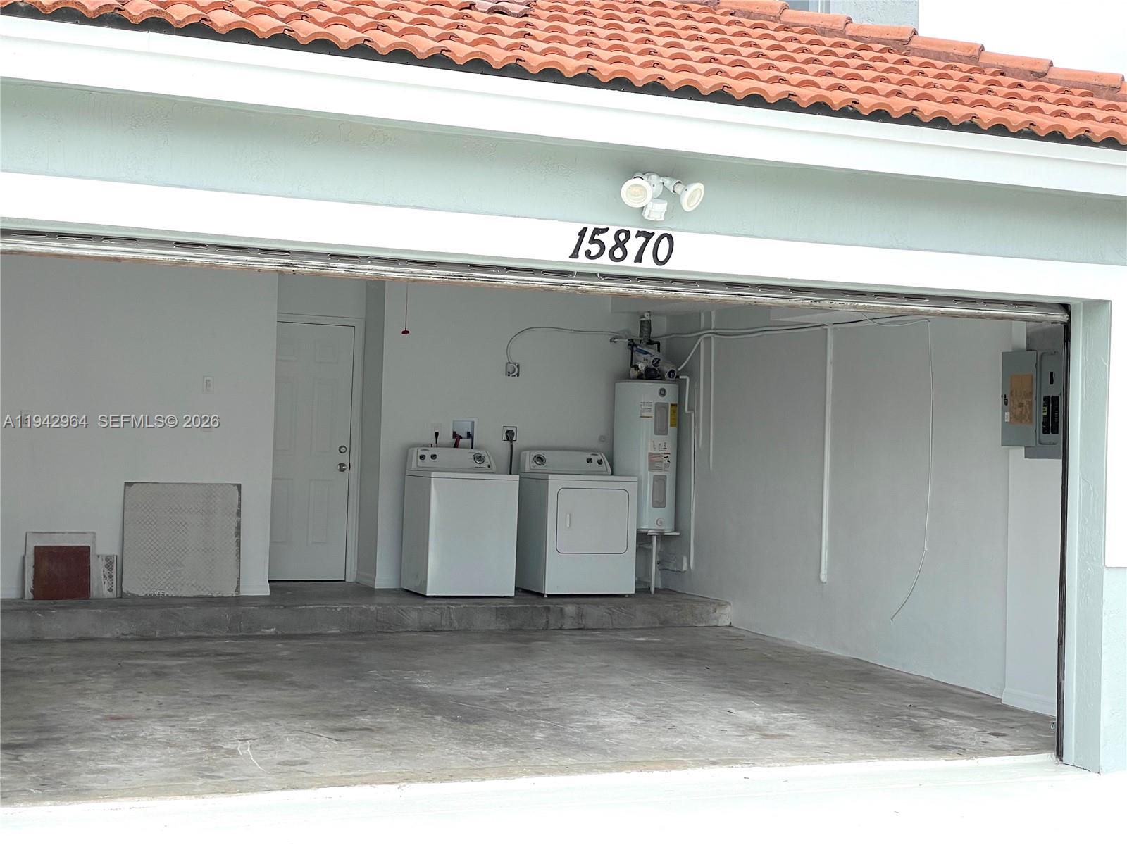 15870 Southwest 85th Lane Miami, FL 33193 - Photo 16 of 18 a view of a garage