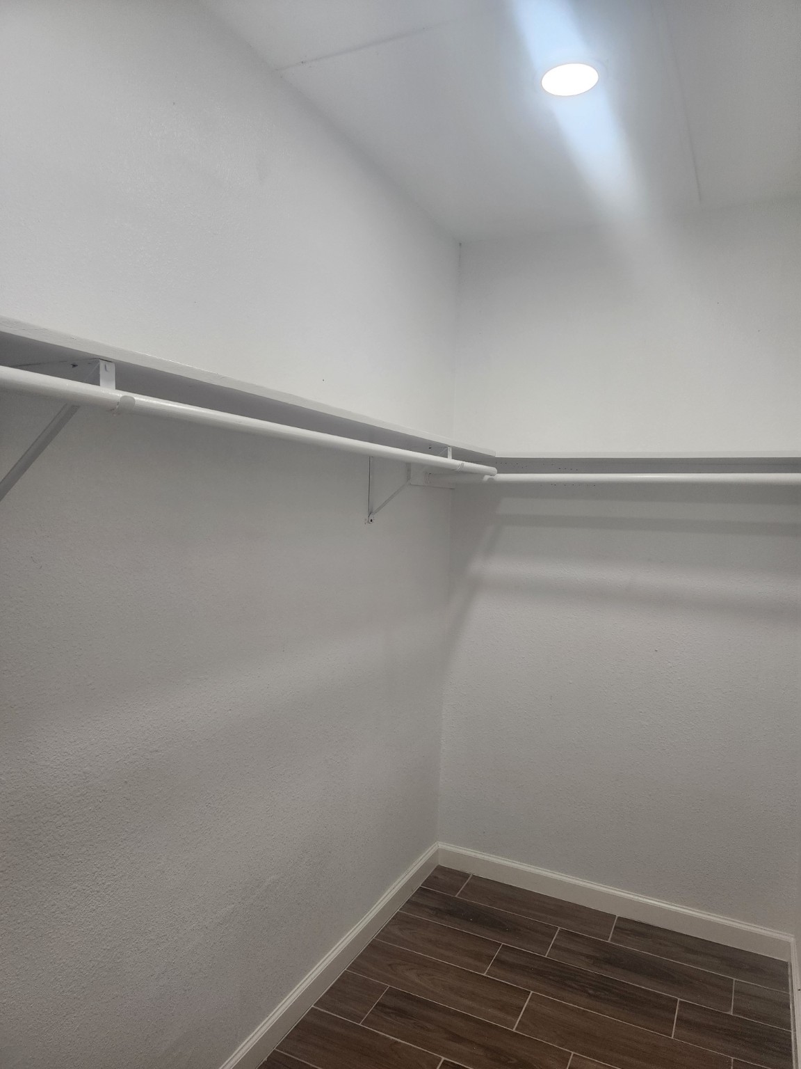 3934 Alice Street Houston, TX 77021 - Photo 5 of 9 a view of an empty walk in closet