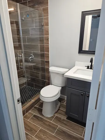 a bathroom with a toilet and a sink