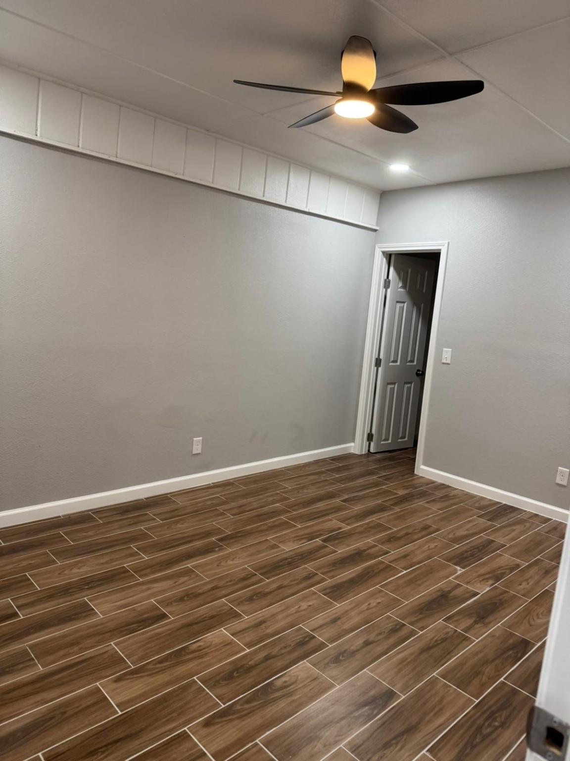 3934 Alice Street Houston, TX 77021 - Photo 9 of 9 a view of empty room with wooden floor