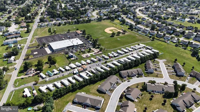 an aerial view of a house with a ocean view