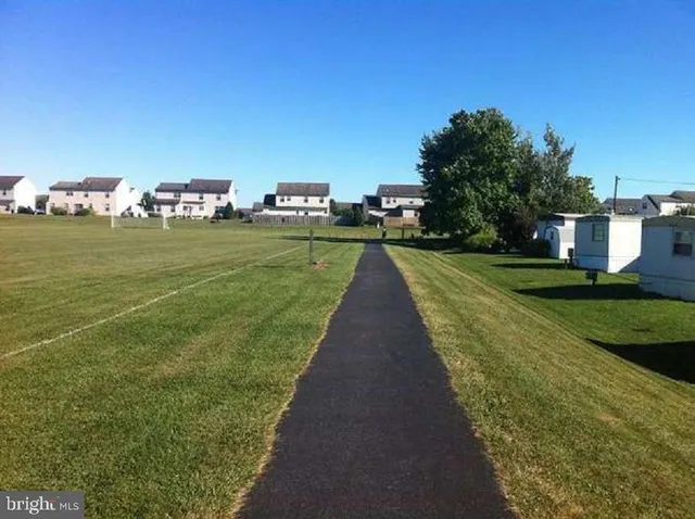 a view of a lake with a big yard