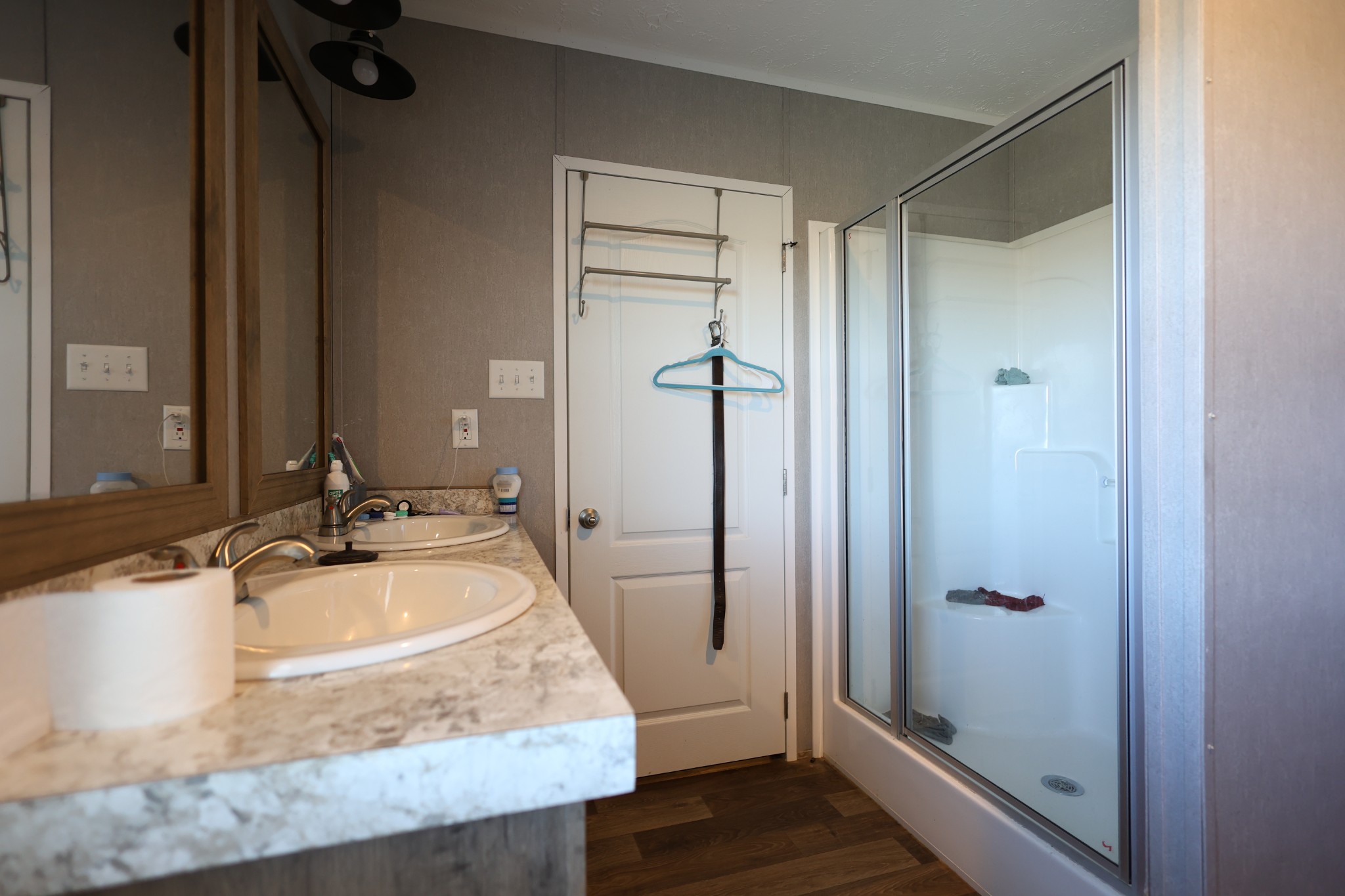 298 Fly Road Shelbyville, TN 37160 - Photo 12 of 21 a bathroom with a granite countertop sink mirror and shower
