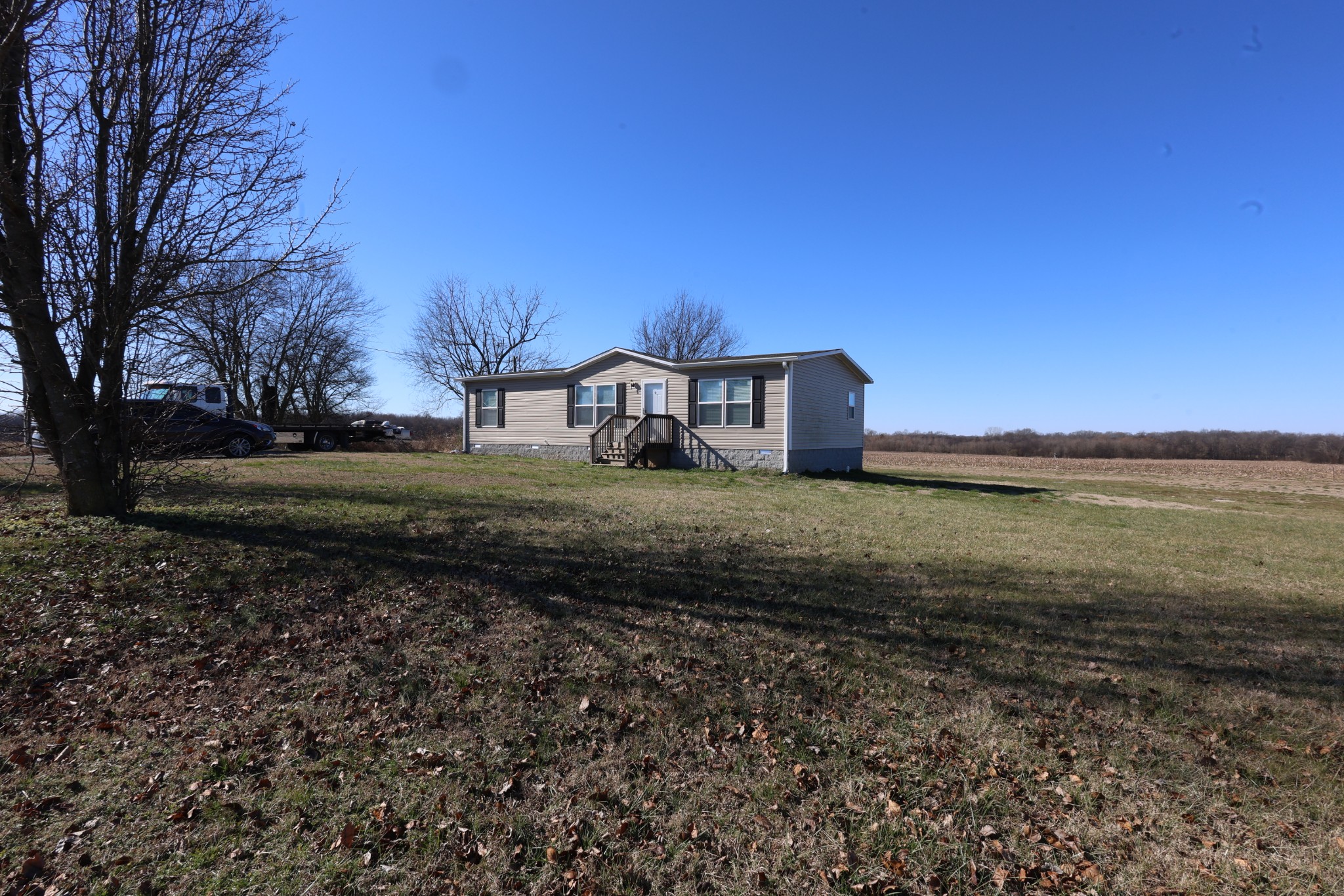 298 Fly Road Shelbyville, TN 37160 - Photo 17 of 21 a view of a house with a yard