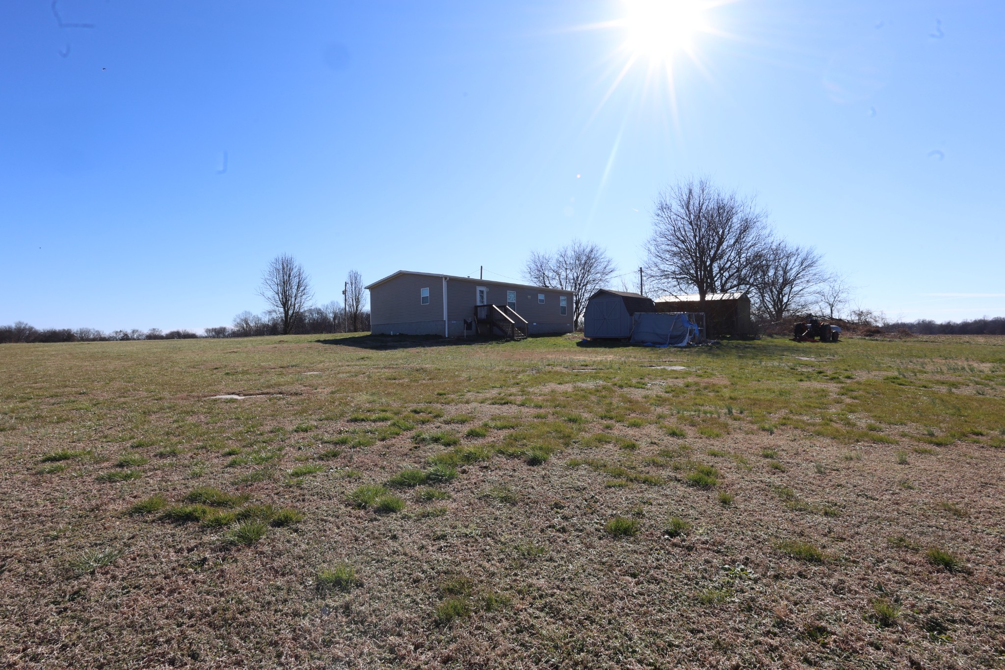 298 Fly Road Shelbyville, TN 37160 - Photo 18 of 21 a view of a lake with a building in the background