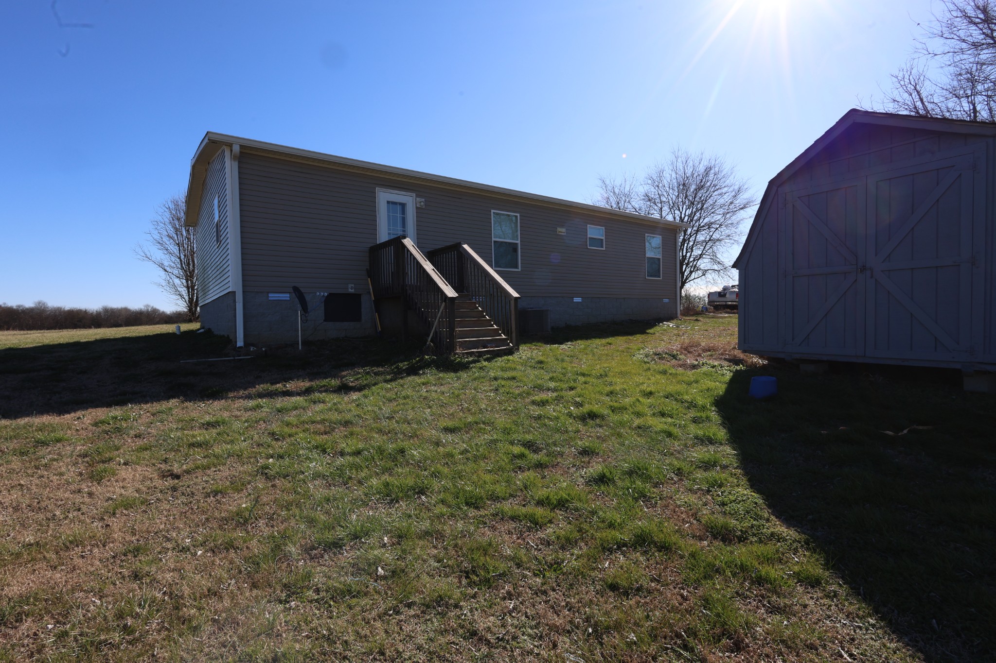 298 Fly Road Shelbyville, TN 37160 - Photo 20 of 21 a backyard of a house