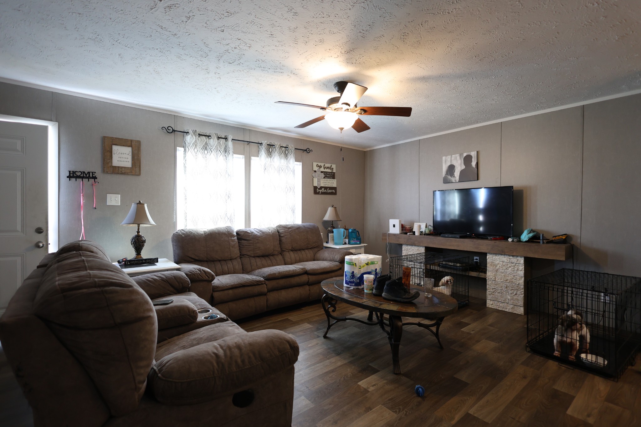 298 Fly Road Shelbyville, TN 37160 - Photo 3 of 21 a living room with furniture a flat screen tv and a window