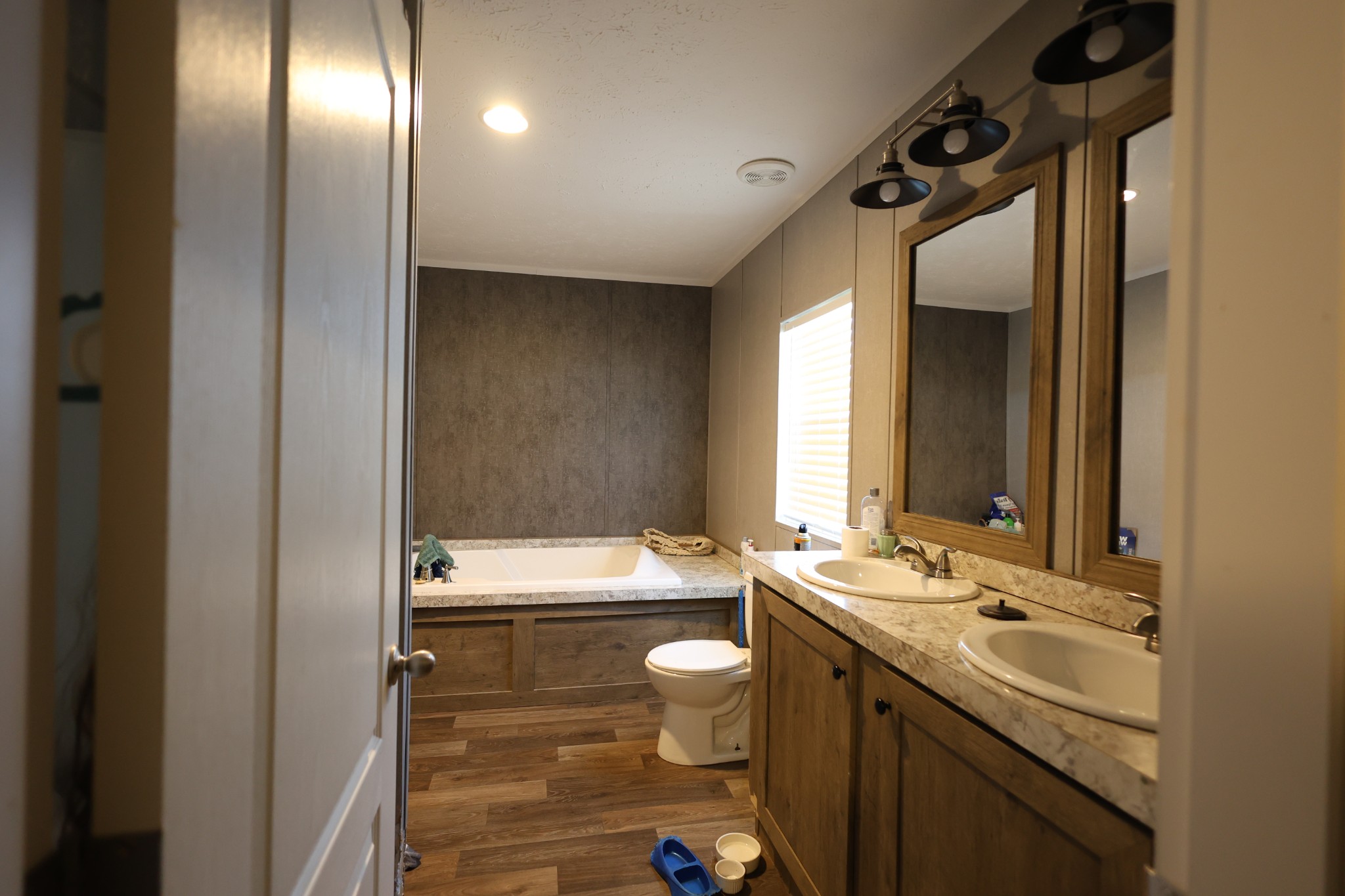 298 Fly Road Shelbyville, TN 37160 - Photo 10 of 21 a bathroom with a granite countertop sink toilet and shower
