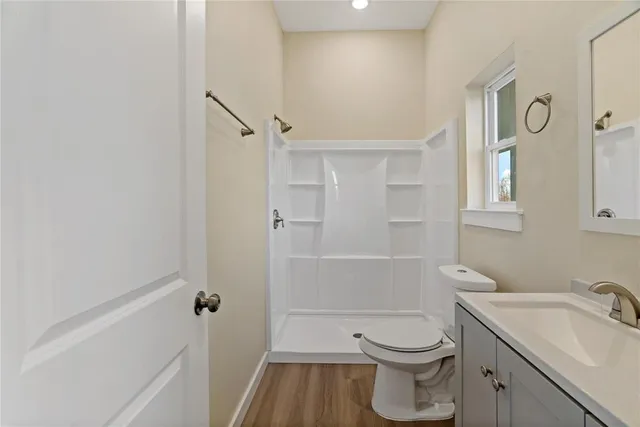 a bathroom with a toilet and a sink