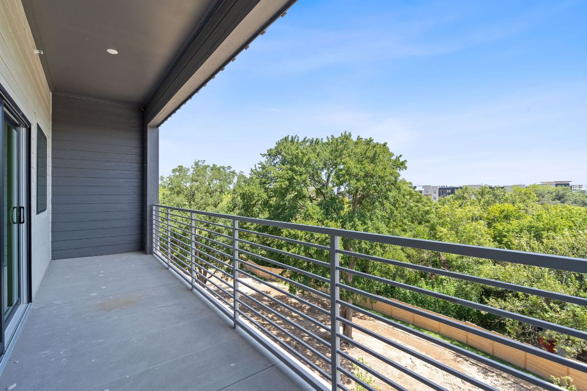 100 West Mockingbird Lane, Unit 308 Austin, TX 78745 - Photo 8 of 23 a view of a balcony with trees