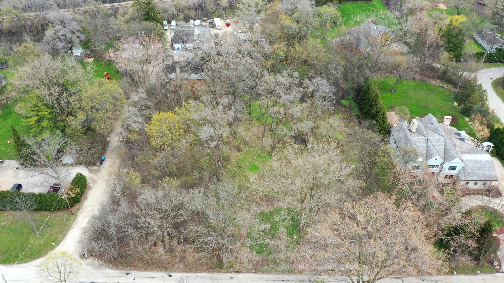0 Highmoor Road Highland Park, IL 60035 - Photo 1 of 9 a view of a yard with large trees