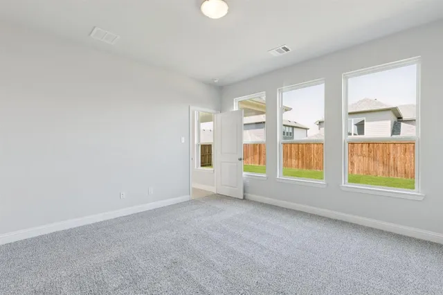 a very nice looking living room with furniture and a large window
