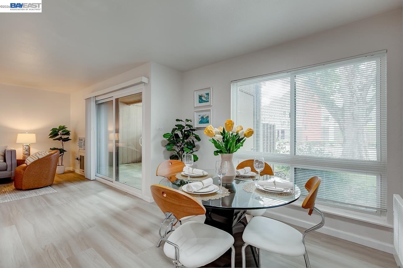 9005 Alcosta Boulevard, Unit 199 San Ramon, CA 94583 - Photo 21 of 57 a dining room with furniture and wooden floor