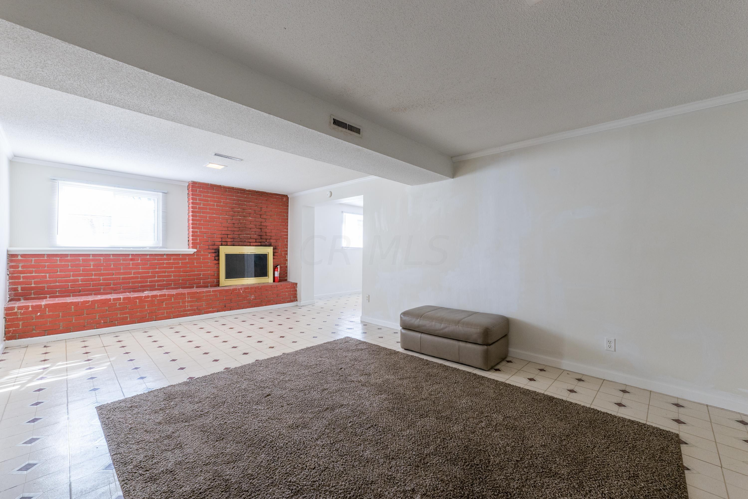 4985 Refugee Road Columbus, OH 43232 - Photo 55 of 74 Family Room w/Fireplace