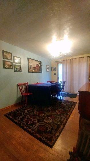 28 Aber Road Finleyville, PA 15332 - Photo 4 of 24 The dining room has sliding glass doors that lead to the patio.