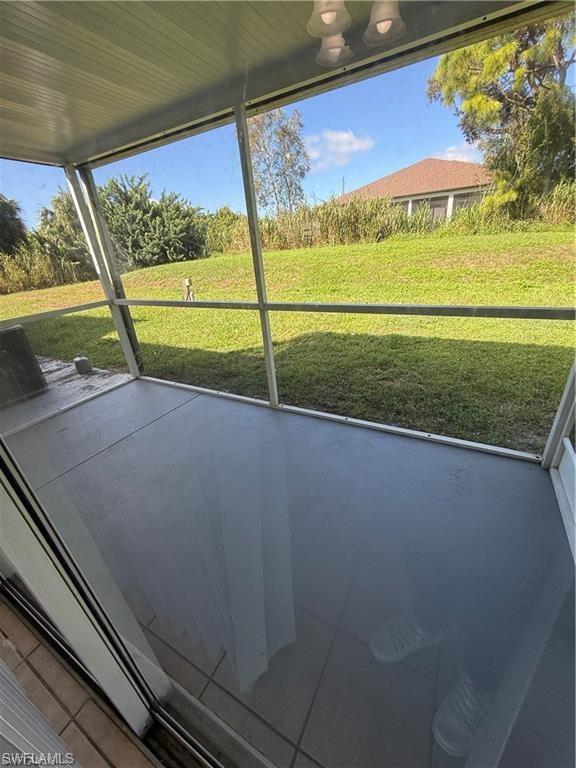 724 Hightower Avenue South Lehigh Acres, FL 33973 - Photo 2 of 7 a view of a room with an outdoor space