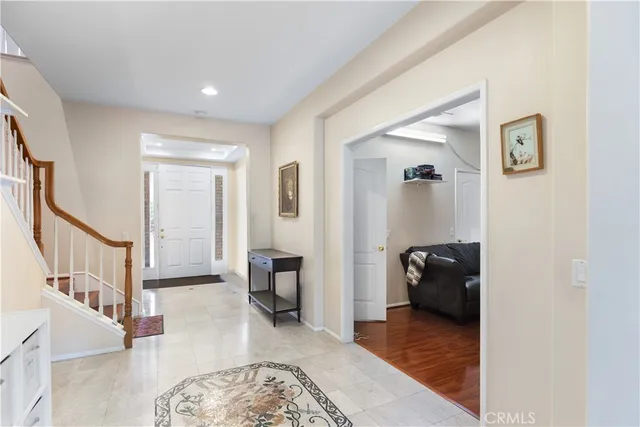a view of livingroom with furniture and workspace