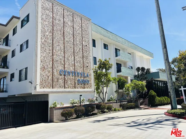 a front view of a building with street view