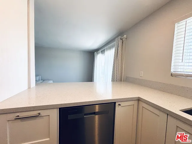 a view of a kitchen with a window