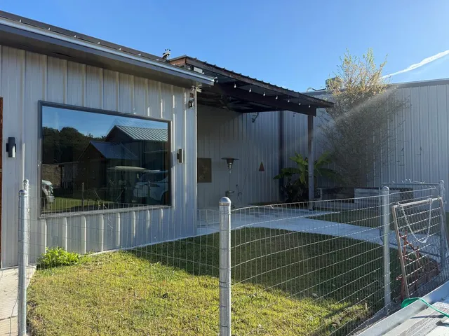 a lobby with furniture and a potted plant